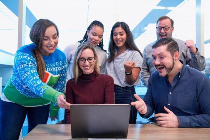 Professional social media management team working together